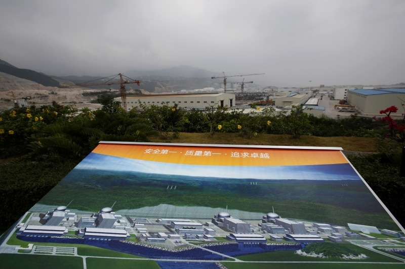 An artist's depiction of the completed Taishan power plant while it's still under construction in the background.