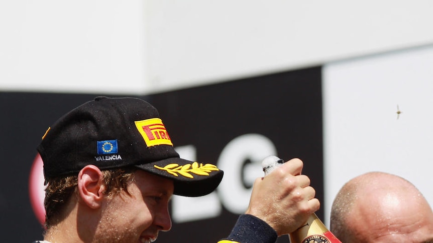 Sebastian Vettel's (L) competitors reckon the F1 championship is already out of reach.