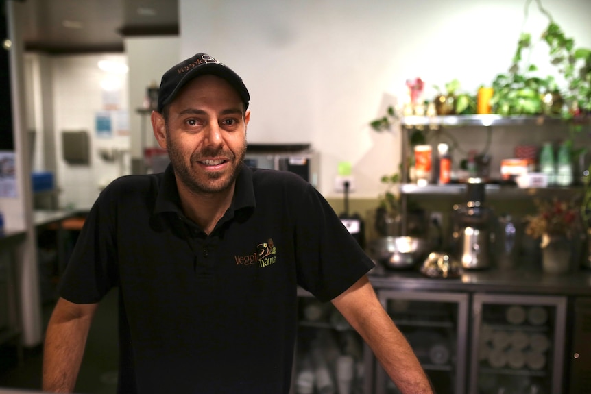 A man at his cafe