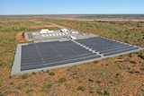 Drone shot of solar farm and gas-fired power station in the red dirt of Onslow