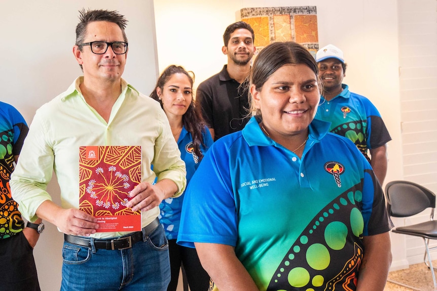 Aboriginal affairs minister with group of Indigenous youth