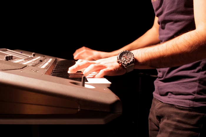 Ahmad Hassani plays his keyboard