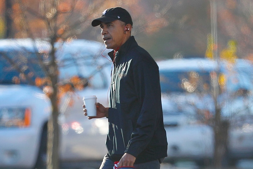 Barack Obama arrives for basketball