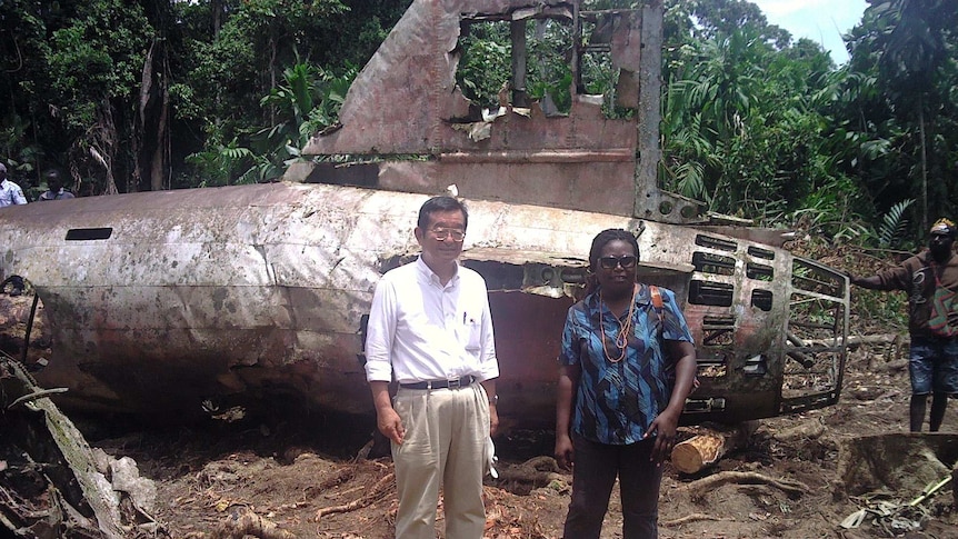 Japanese ambassador to PNG HE Hiroharu Iwasaki with Deputy Director of National Planning at the Yamamoto crash site