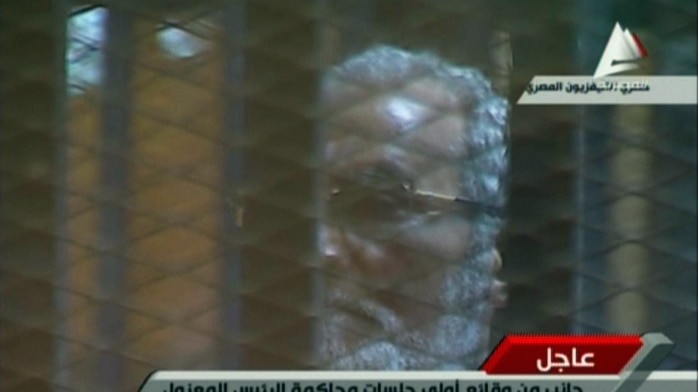 Deposed Egyptian president Mohamed Morsi in glass cage
