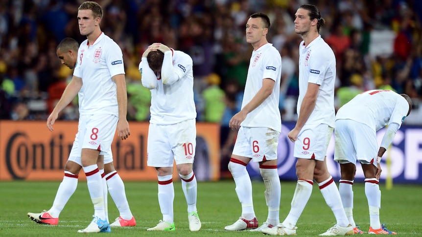 England players react after being defeated by Italy 4-2 on penalties at Euro 2012.