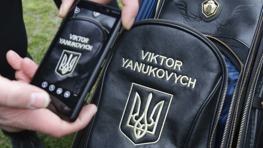 Anti-government protesters found the Ukraine ex-president's golf bag