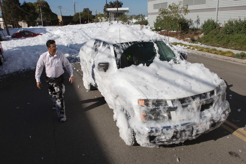 Car covered in foam
