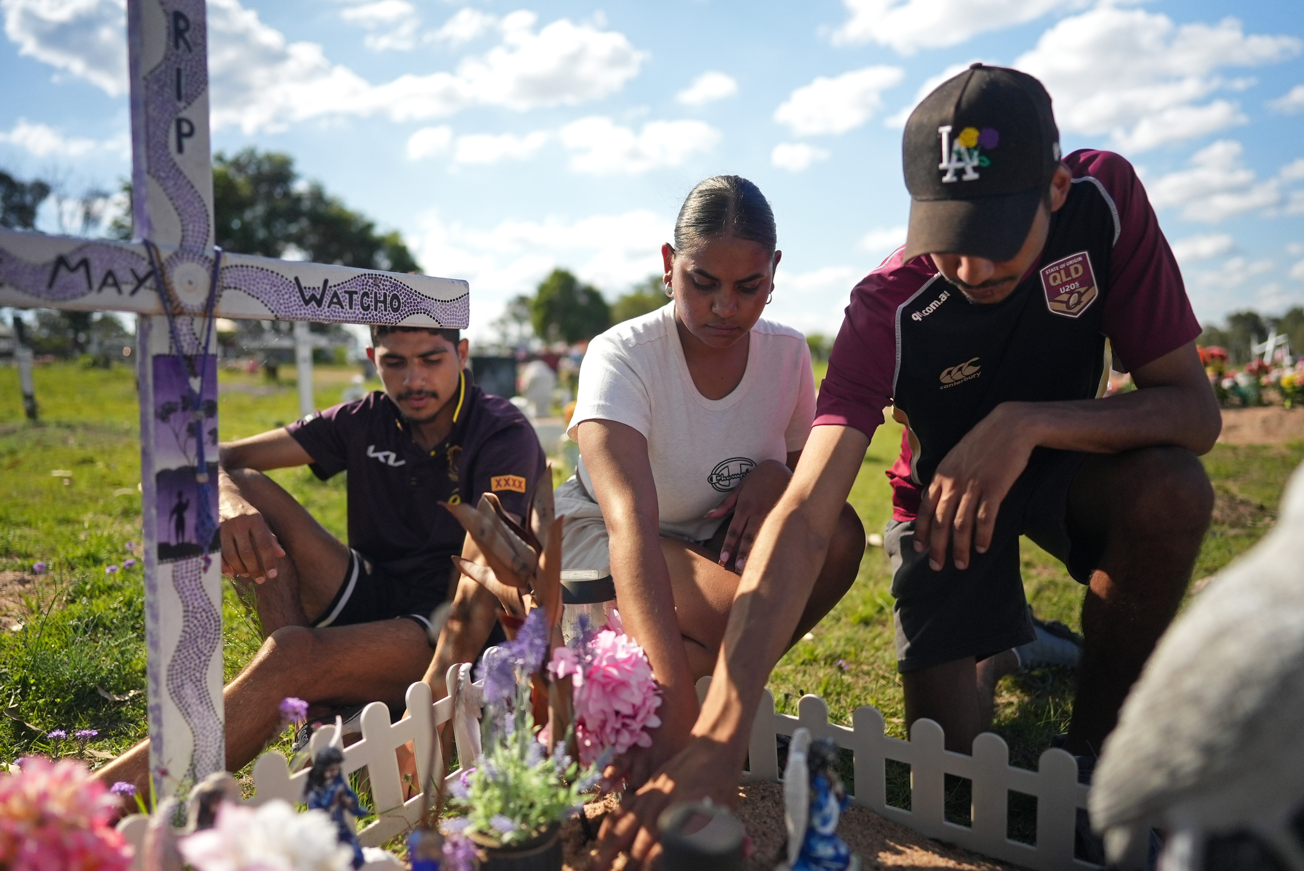 Michael, Rose and Orlyn at the graveside of their mother, Constance Watcho.