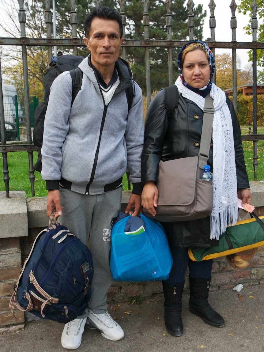 Farzona, 32, and her husband, Hanan, 37, have been waiting outside the Traiskirchen refugee camp in Austria for three days.
