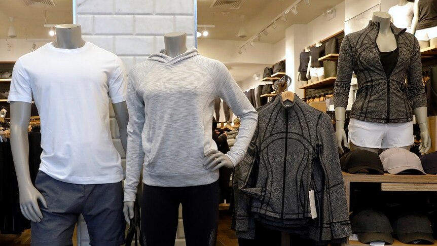 Lululemon clothes on display inside a store.