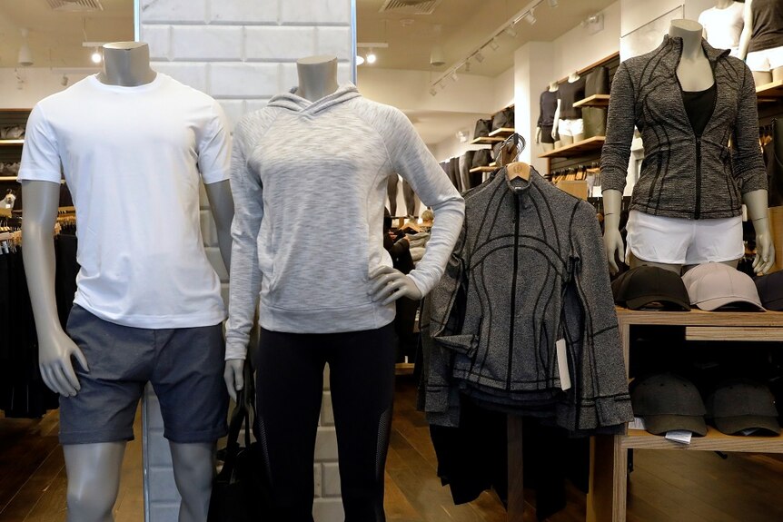 Lululemon clothes on display inside a store.