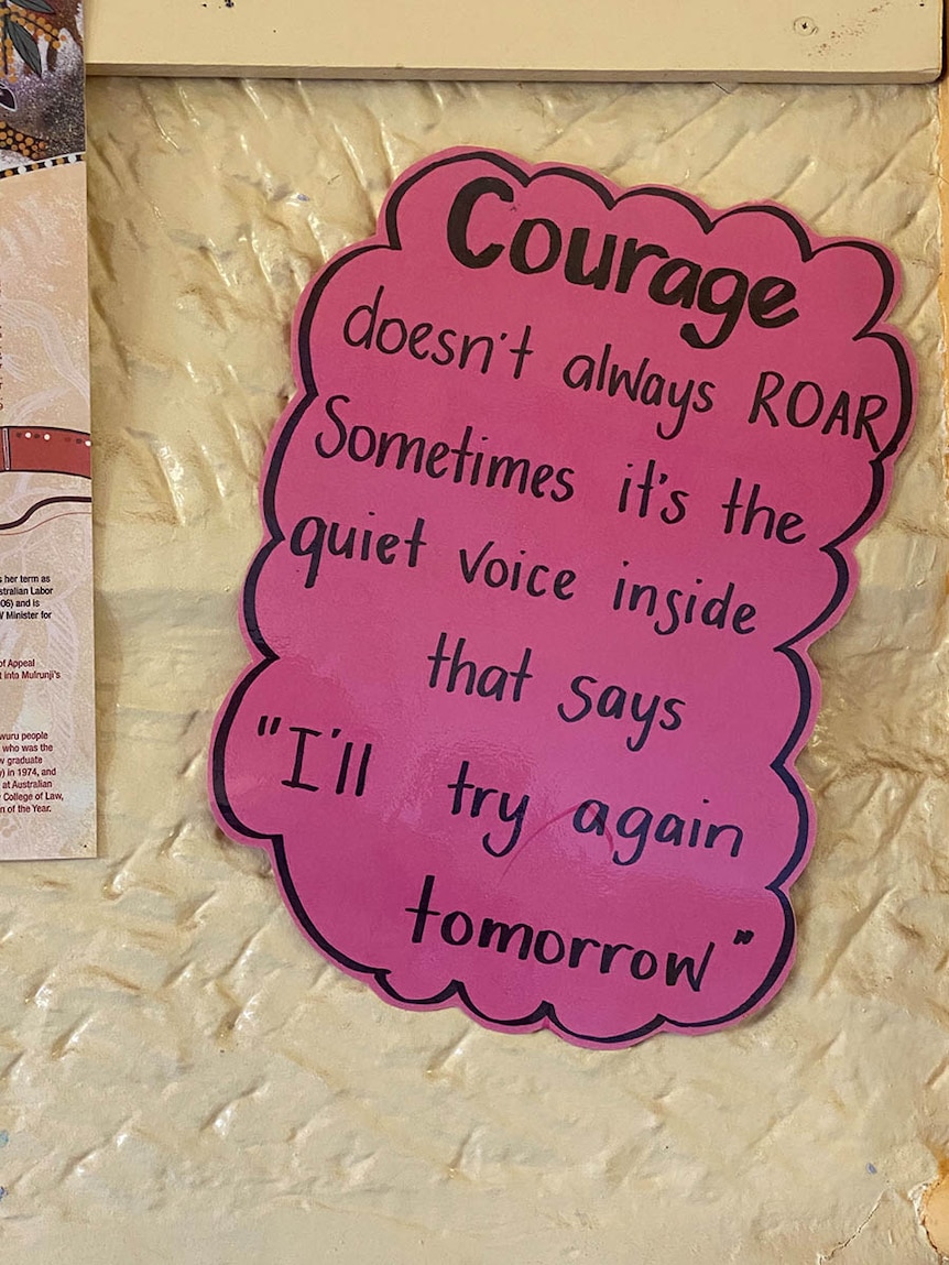 A sign that says: Courage doesn't always roar. Sometimes it's the quiet voice inside that says 'I'll try again tomorrow