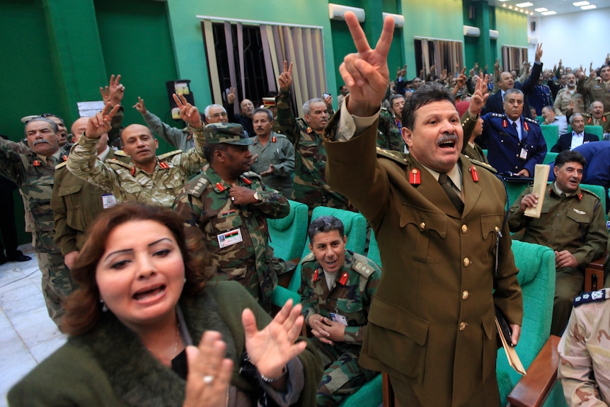 Delegates celebrate capture of Abdullah al-Senussi