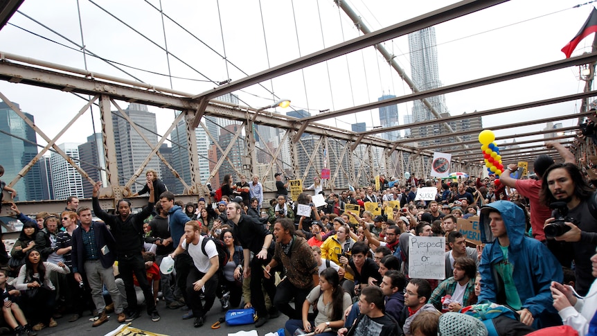 Protesters occupy Brooklyn Bridge during an Occupy Wall Street march in New York. (Reuters: Jessica Rinaldi)