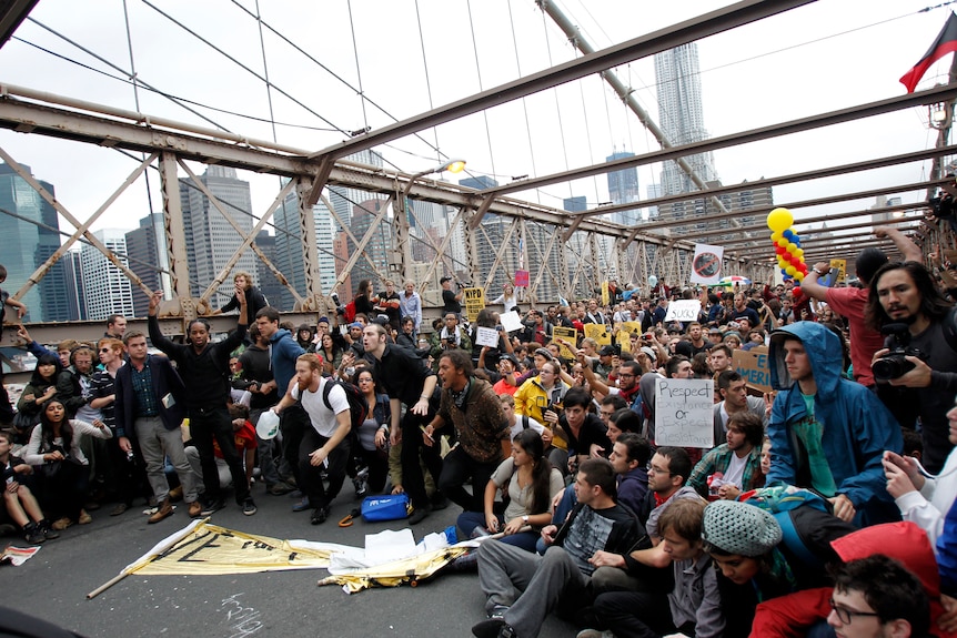 Protesters occupy Brooklyn Bridge during an Occupy Wall Street march in New York. (Reuters: Jessica Rinaldi)