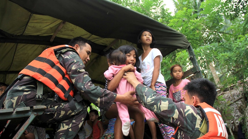 Villages evacuated amid warning typhoon rains could trigger mudflows