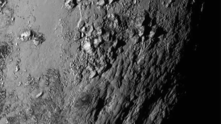 A close-up captured by New Horizons during its closest pass by Pluto reveals a range of mountains as high as 3,500 metres.