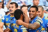 Try time ... Eels centre Ryan Morgan celebrates his try with team-mates.