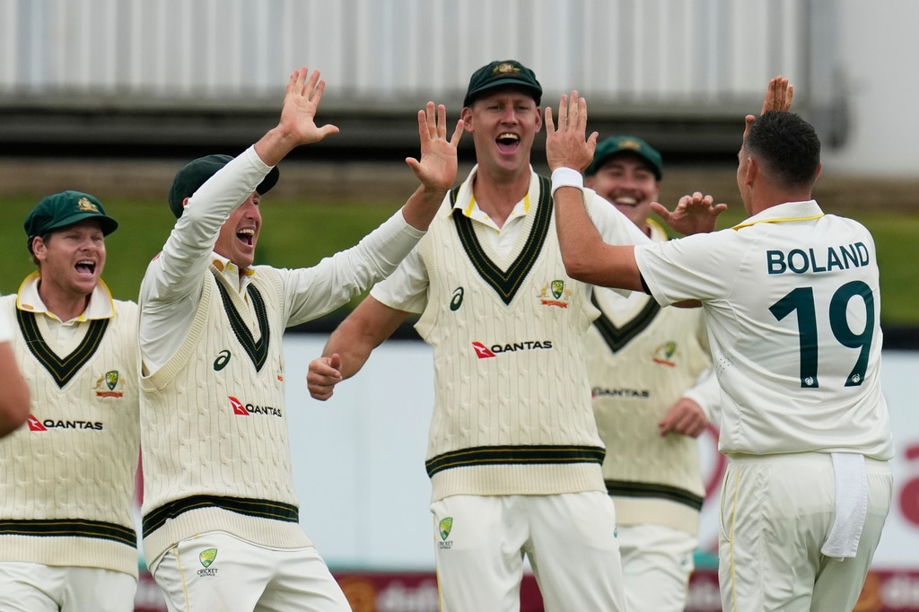Scott Boland celebrates