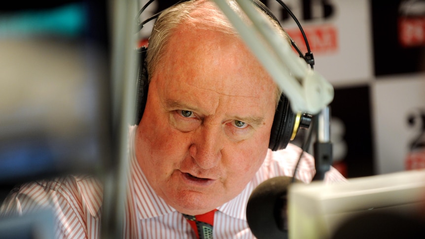 Radio broadcaster Alan Jones speaks on air.