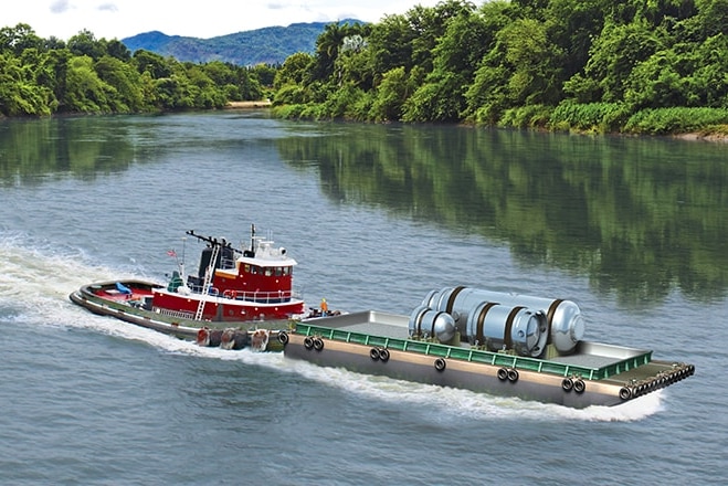 A nuclear reactor on a barge pushed by a tugboat