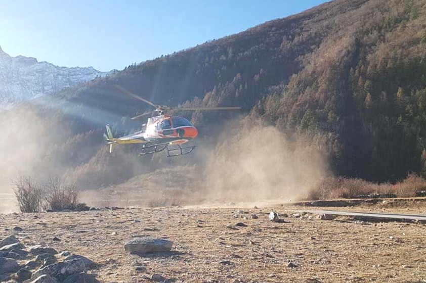 Helicopter lands in remote area in Nepal to rescue sick Australian traveller Amanda McDonald who was trekking in the area.