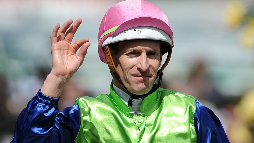 Winning form ... Hugh Bowman celebrates after riding Sangster to win the Victoria Derby (AAP Image: Joe Castro)