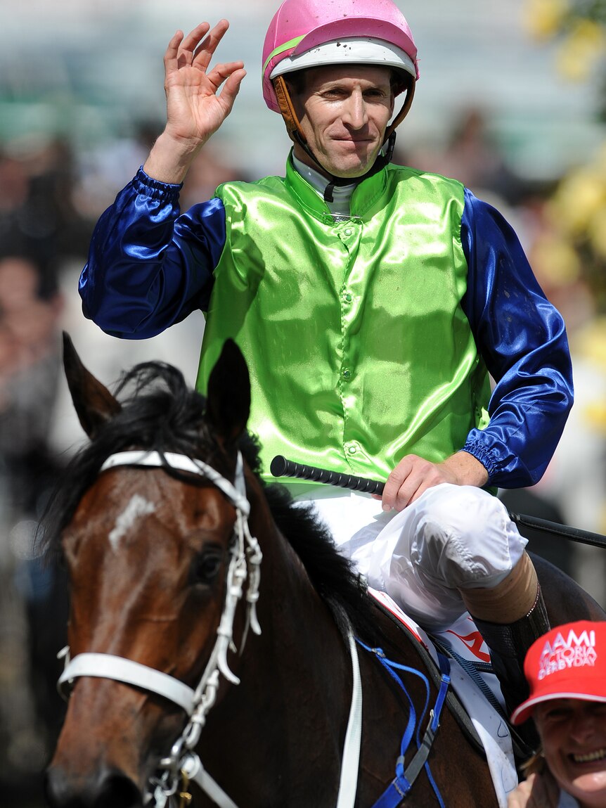Winning form ... Hugh Bowman celebrates after riding Sangster to win the Victoria Derby (AAP Image: Joe Castro)