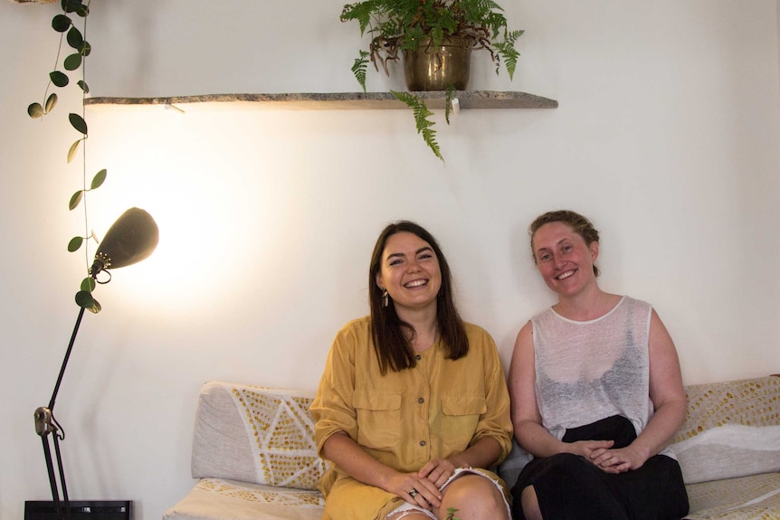 Clare Davidson and architect Emerald Wise inside the tiny apartment