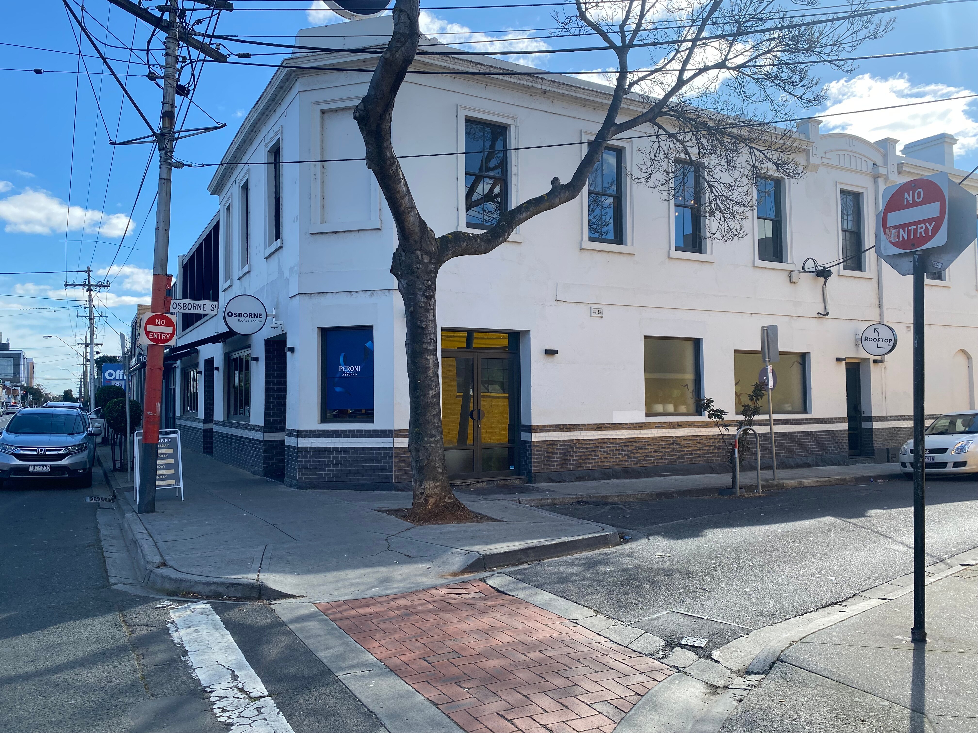 A white-coloured, two-storey bar in South Yarra, inner Melbourne