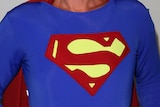 Generic close-up of a man wearing a superman costume.
