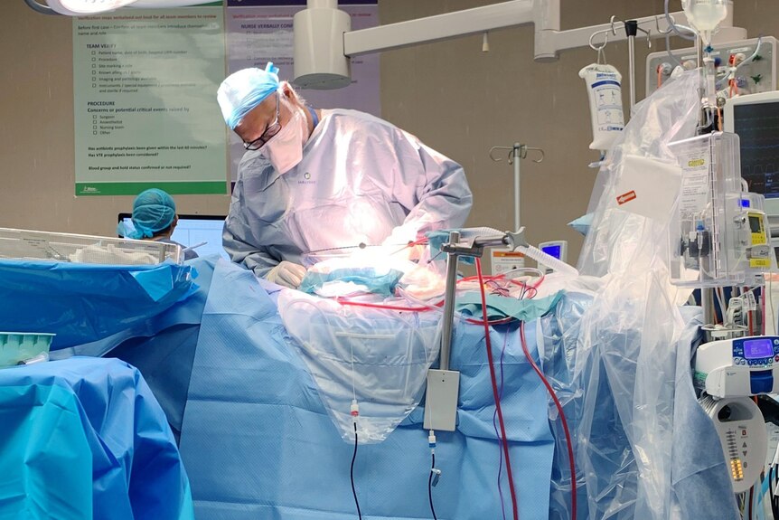 An image of a surgeon operating 