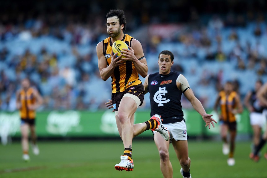 Hawthorn's Jordan Lewis marks against Carlton on September 5, 2015.