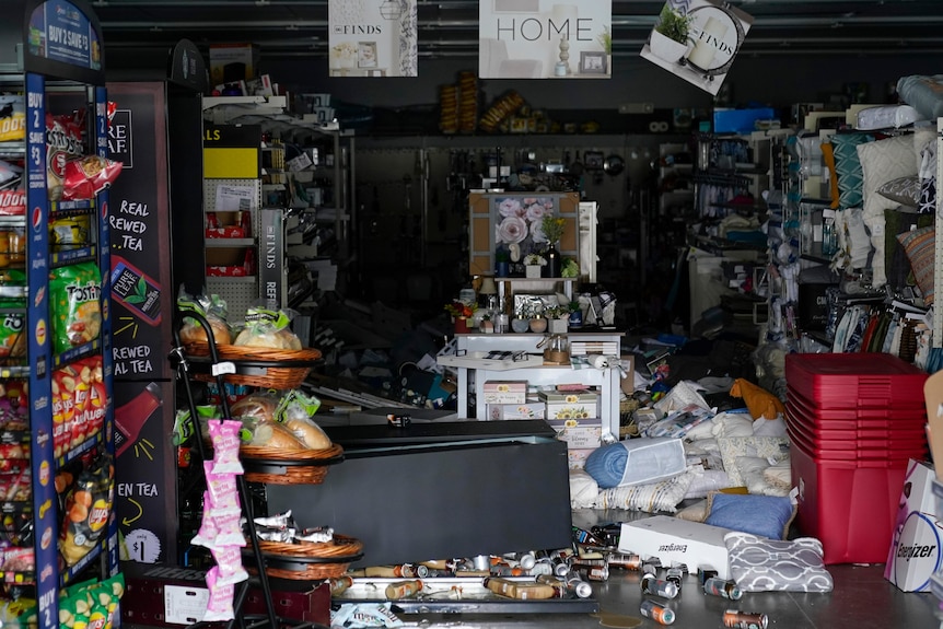 A general shop with items all over the floor