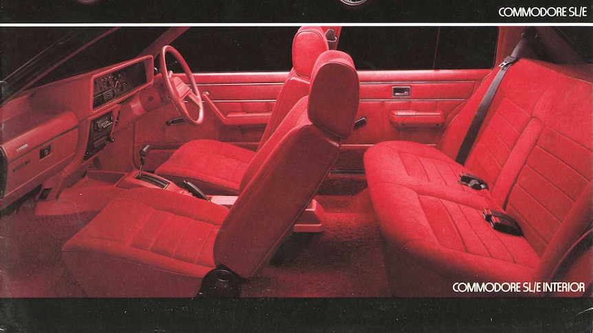 Commodore SLE advert featuring red interior