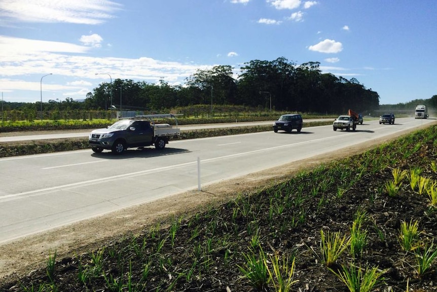 Cars on a newly-built freeway