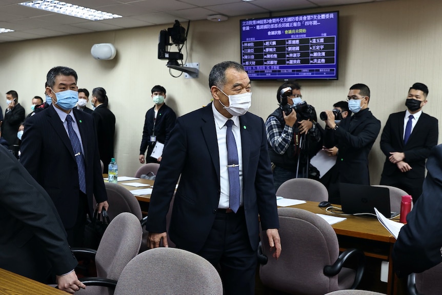 Defence Minister Chiu Kuo-cheng arrives at the parliament in Taipei, Taiwan.