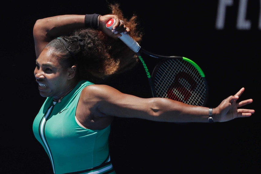 Serena Williams plays a forehand down the line at the Australian Open.