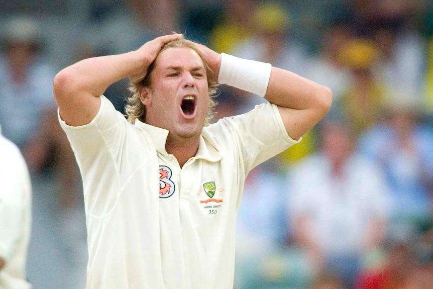Shane Warne expresses disbelief after narrowly failing to claim a wicket.