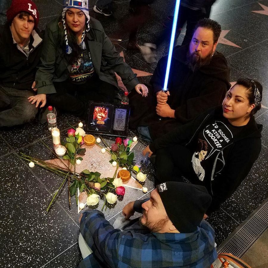 Fans honour Carrie Fisher at star