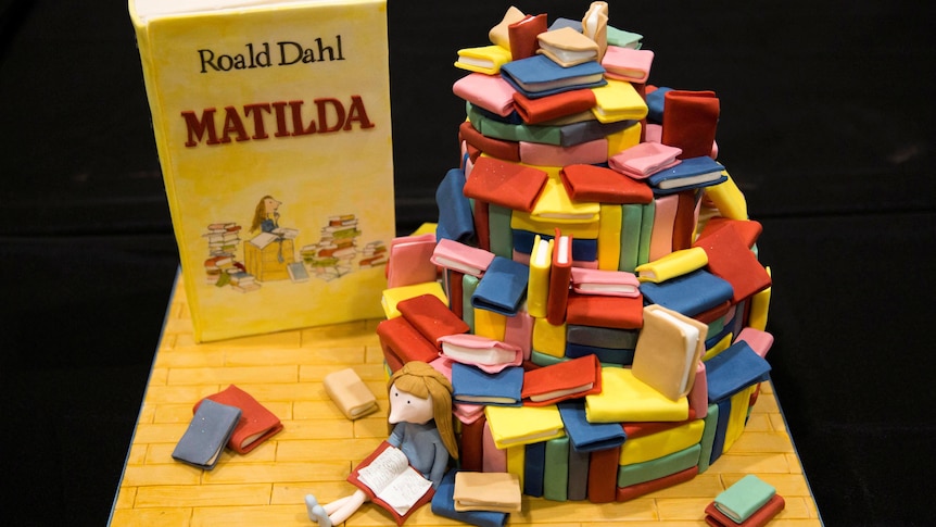 A cake decorated in the style of the Roald Dahl children's book Matilda