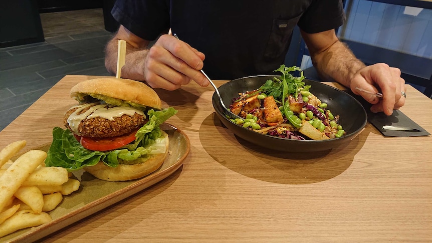 A vegan burger and vegan rice bowl