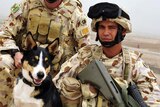 Sapper Darren Smith and explosive detection dog Herbie at Tarin Kowt