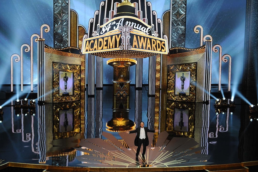 Oscars host Billy Crystal opens the ceremony