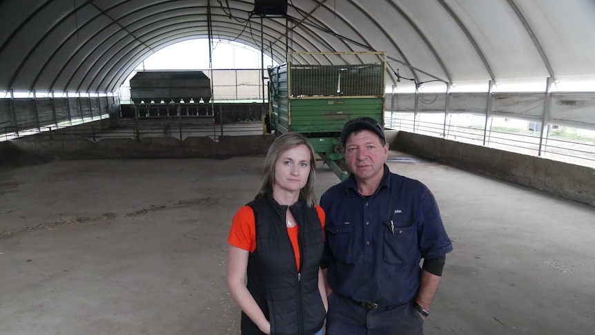 Bethany Paterson and John Duka in an empty pig shed.