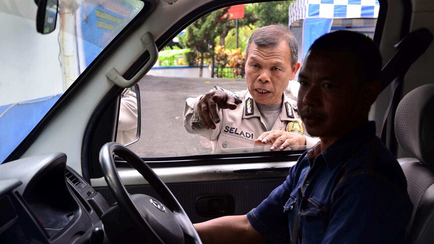 Seladi works for the Indonesian police