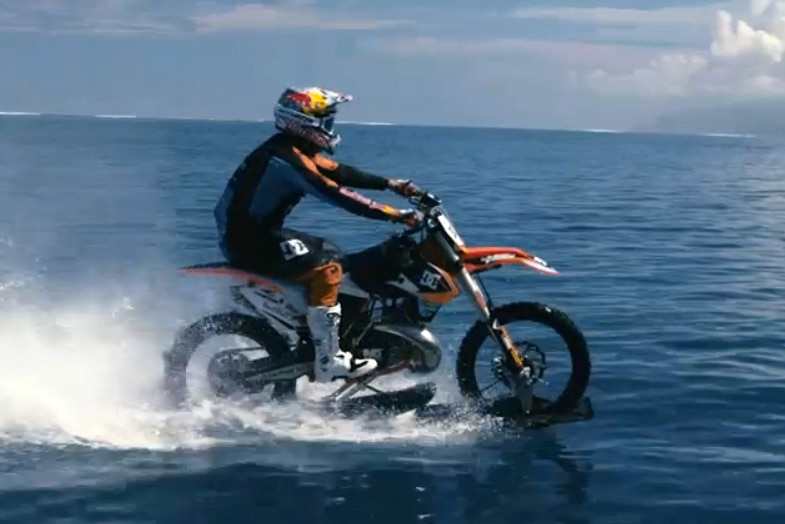 Australian daredevil Robbie Maddison riding his dirt bike on water in 2015.