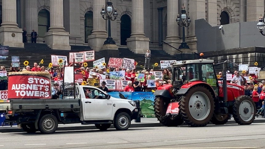 Tractors driving past Parliament House