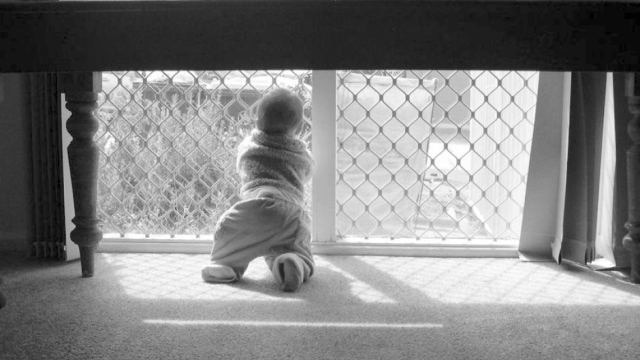 Child at window